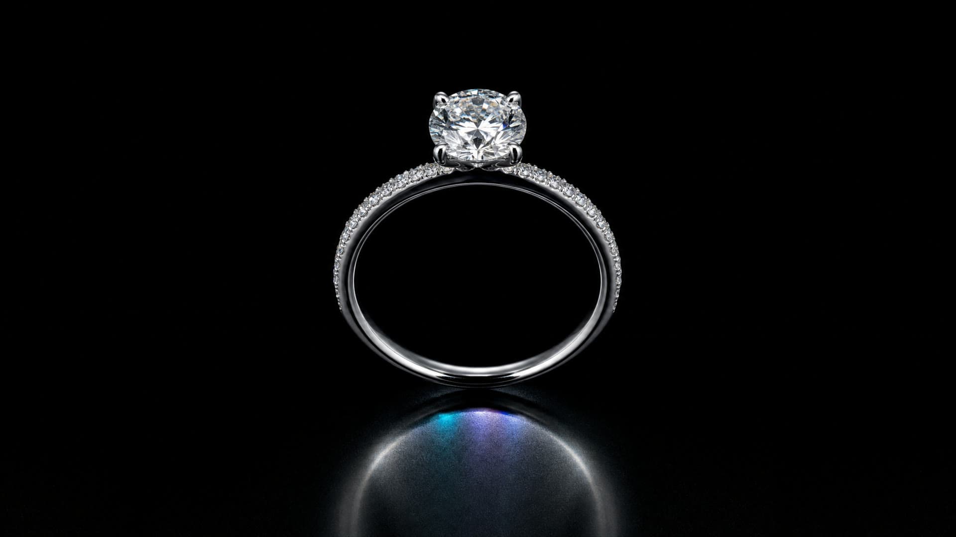 Finished diamond ring against a dark background